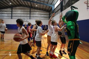 The Jack Jumper mascot greets junior basketballers